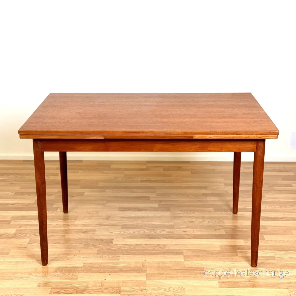 Matbord i teak med 2 iläggsskivor, 1950-60-tal, Sverige