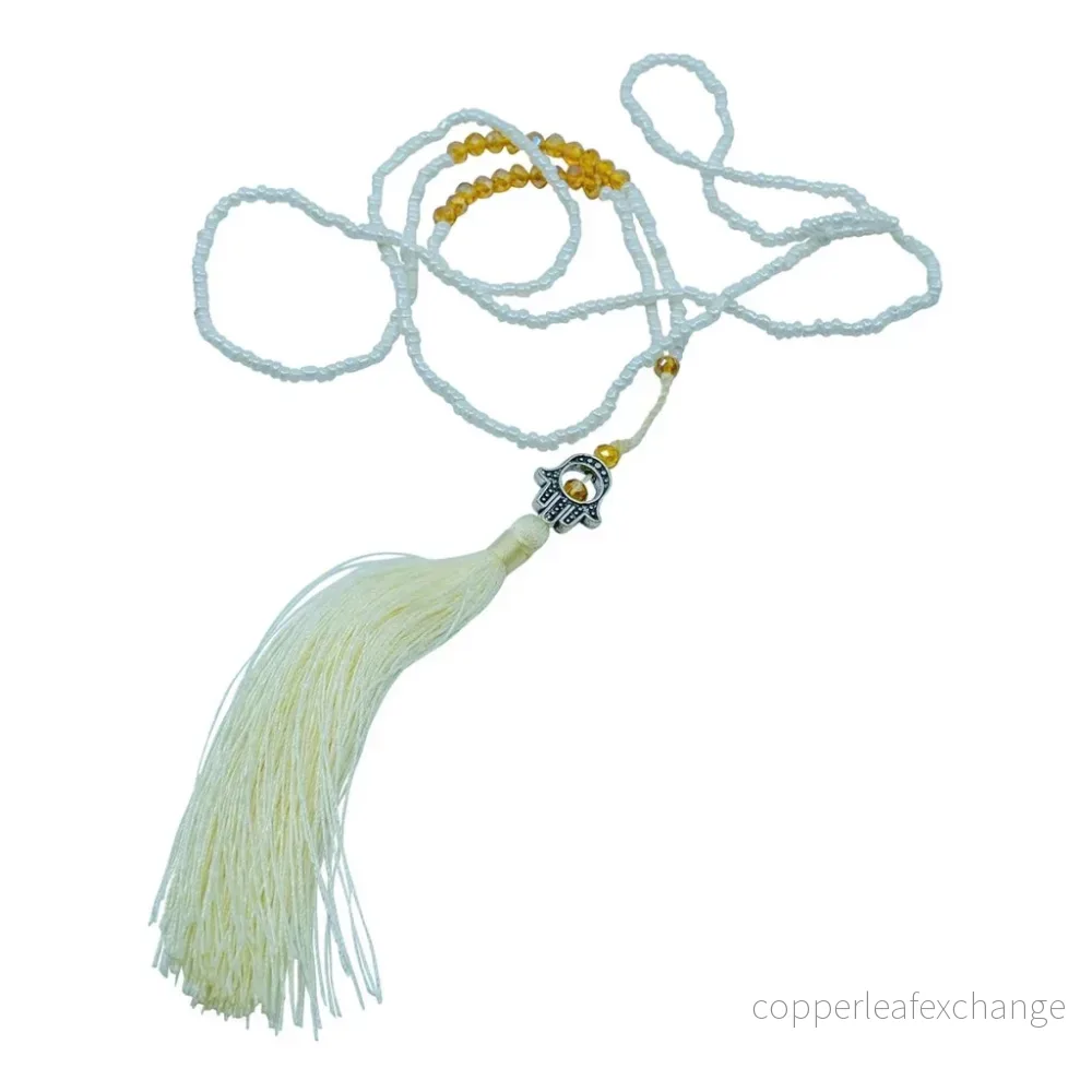 Halsband liten Fatimas hand med tofs