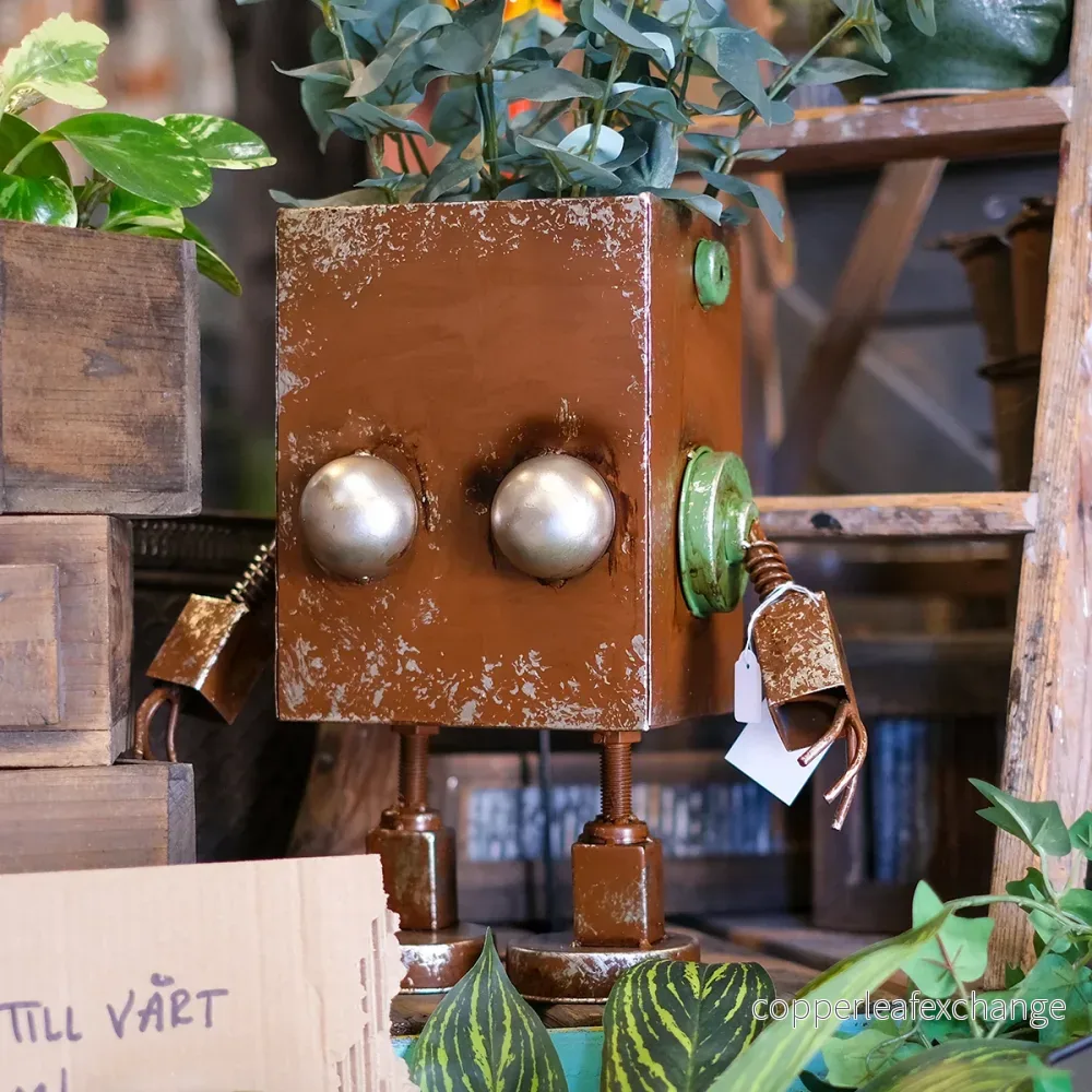 Robotkruka i återvunnen metall Robotkruka i återvunnen metall