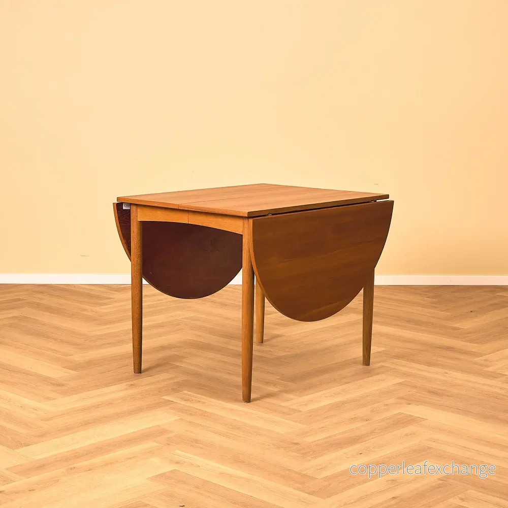 Danskt matbord i teak och ek "Arne Vodder-stil"