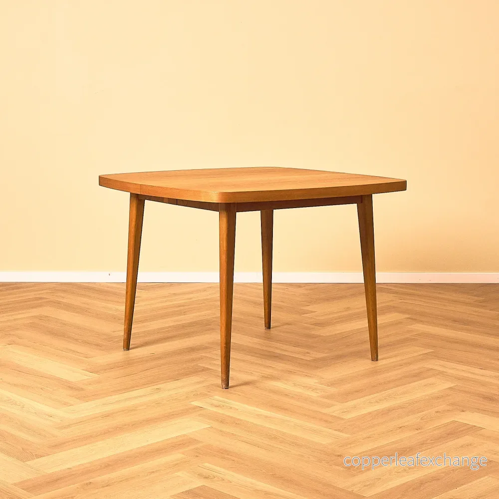 Swedish square dining table in teak and oak by AB Möbelfabriken Linden Swedish square dining table in teak and oak by AB Möbelfabriken Linden