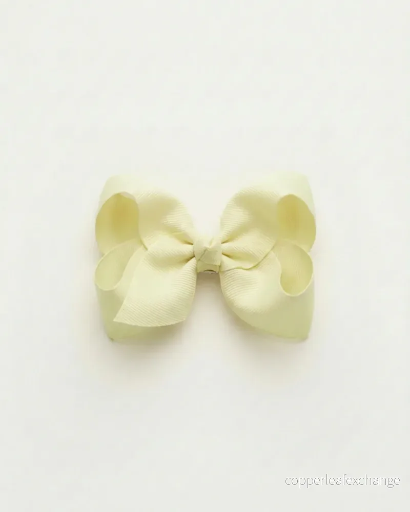 Mellanstor hårrosett, light yellow Mellanstor hårrosett, light yellow