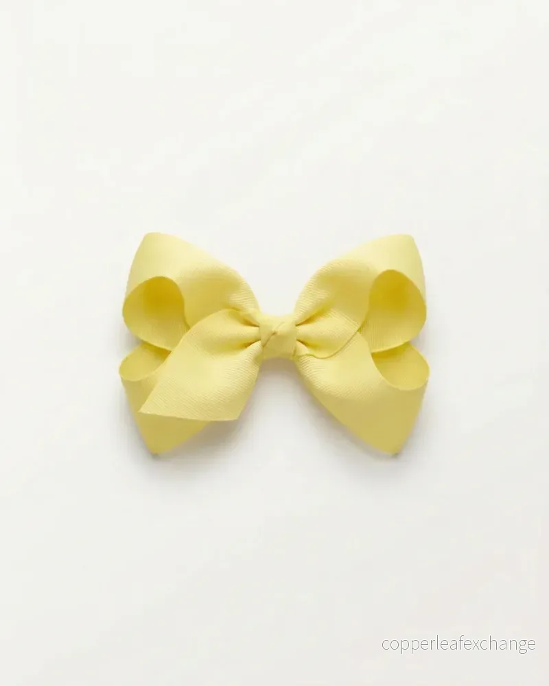 Mellanstor hårrosett, lemon Mellanstor hårrosett, lemon