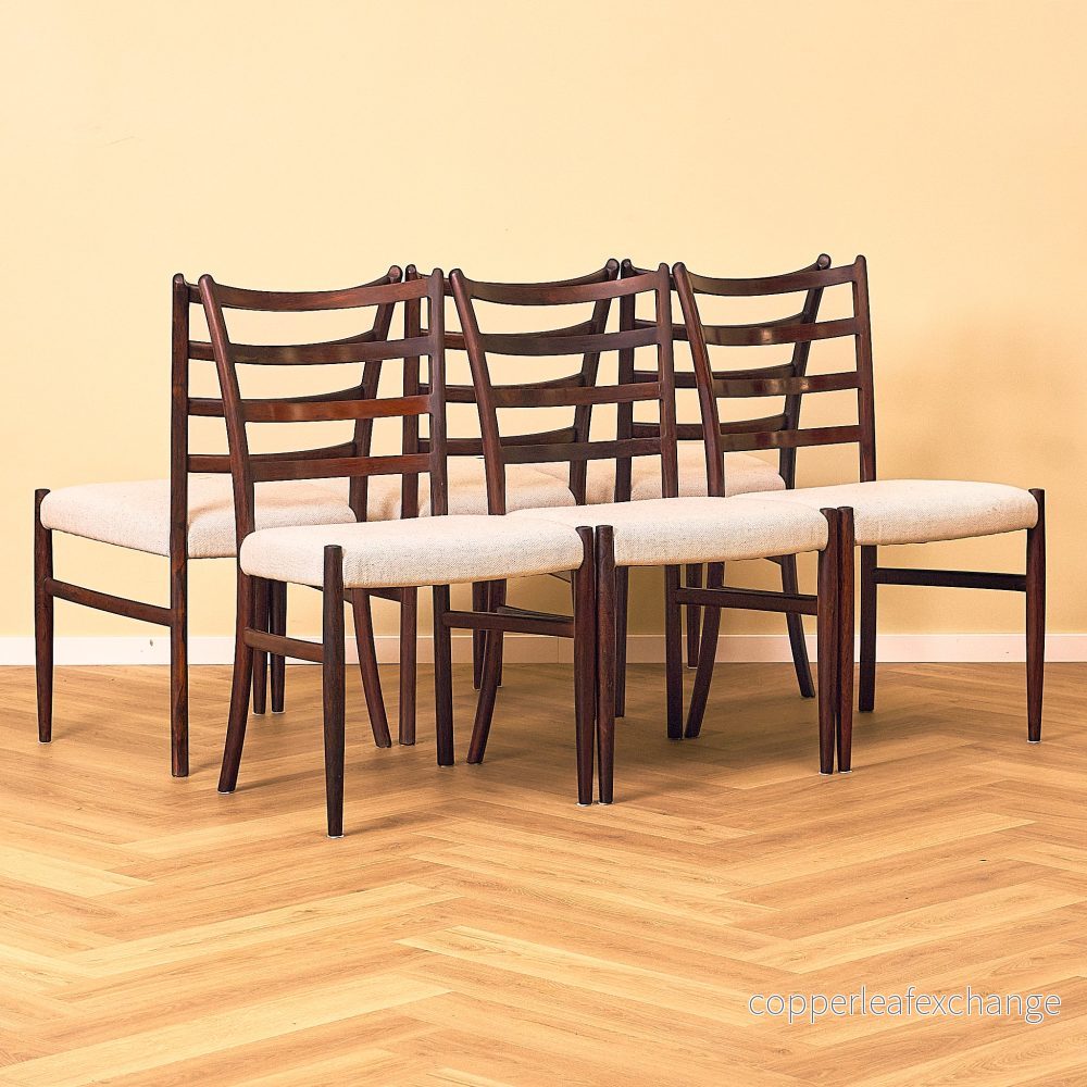 Danish dining chairs in Santos rosewood by Schou Andersen Furniture Factory