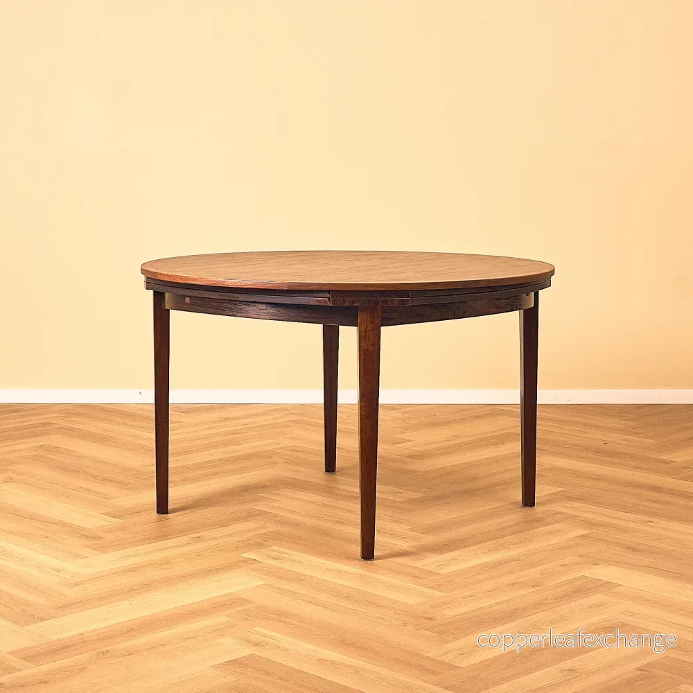 Danish round dining table in Santos rosewood, model 'Flip-Flap' by Dyrlund