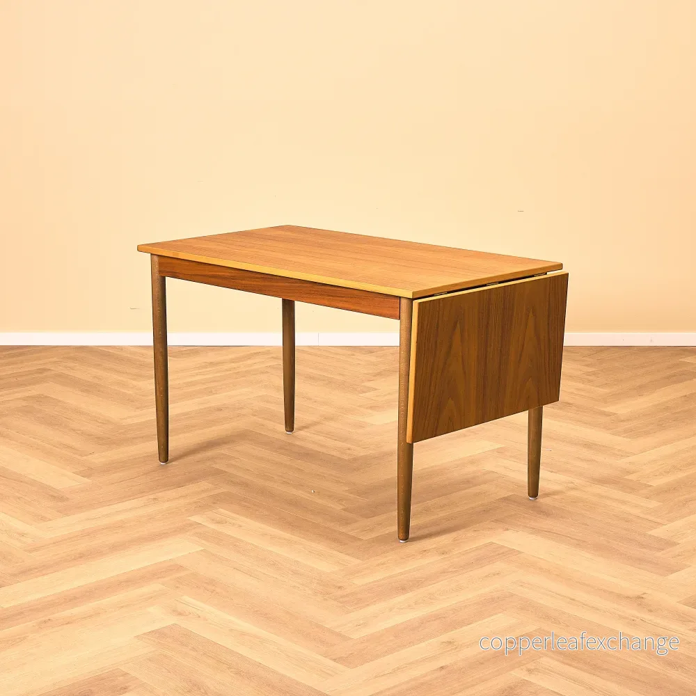 Svenskt rektangulärt bord i teak och bok