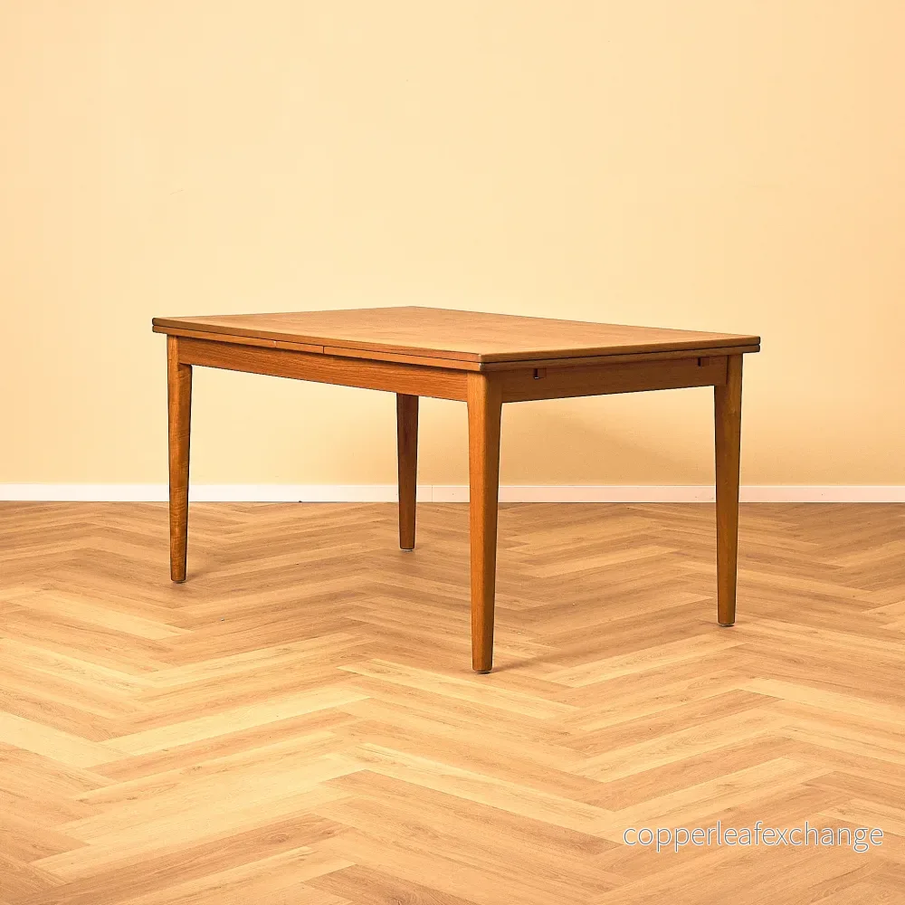 Danish dining table in teak by Skovby